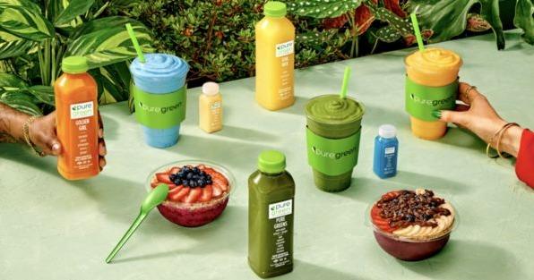 Pure Green smoothies, cold-pressed juices and acai bowls on display, highlighting healthy juice bar franchise expansion in Tampa