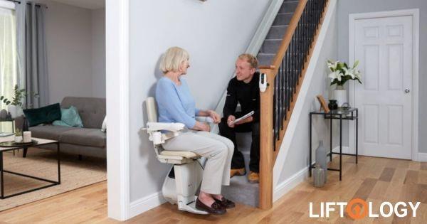 Lifology stairlift installation consultation in St. Louis home, highlighting aging-in-place franchise services