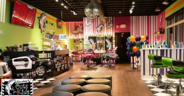 Sharkey&rsquo;s Cuts for Kids colorful children&rsquo;s salon interior, highlighting family-friendly kids haircut franchise experience