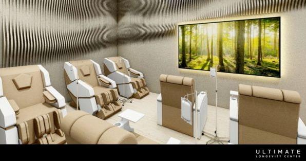 Ultimate Longevity Centers franchise wellness lounge featuring recovery chairs, highlighting longevity and wellness services 