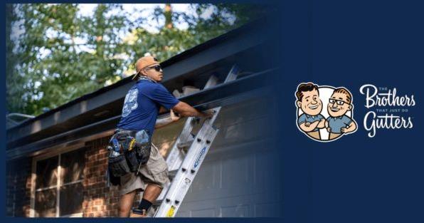 The Brothers That Just Do Gutters franchise technician installing gutters, highlighting residential gutter repair and installation 