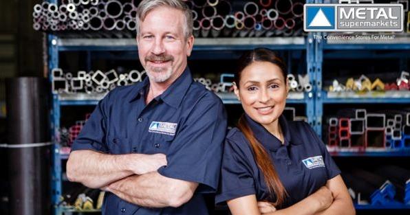 Metal Supermarkets franchise team in metal warehouse, highlighting custom metal supply and fabrication services