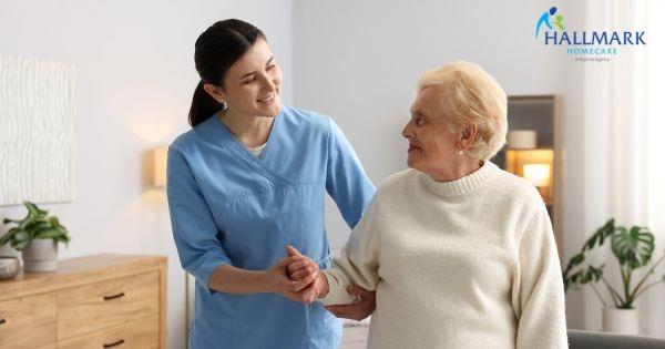 Hallmark Homecare franchise in Moraga, California, featuring a caregiver assisting a senior woman with compassionate in-home care